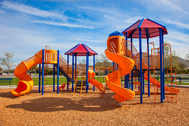 PRESSURE CLEANING PLAYGROUND EQUIPMENT